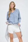 Washed v-neck exposed seam long sleeve knit top