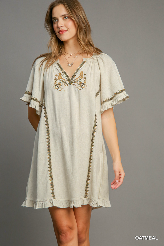 Linen peasant mini dress with ruffle trim, split neck and embroidery Dress Umgee