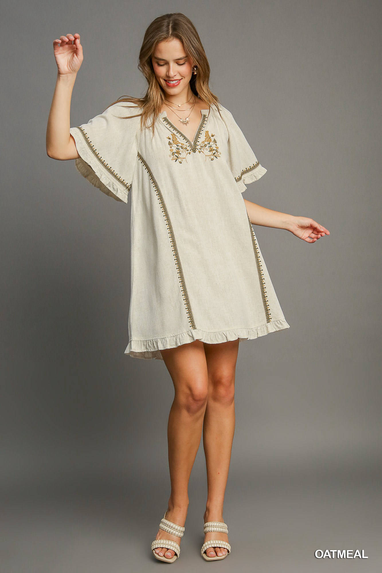 Linen peasant mini dress with ruffle trim, split neck and embroidery Dress Umgee