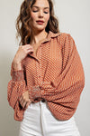 Printed blouse top with collared neckline, button down front, and smocked cuffs Blouse EE:Some