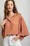 Printed blouse top with collared neckline, button down front, and smocked cuffs Blouse EE:Some
