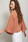 Printed blouse top with collared neckline, button down front, and smocked cuffs Blouse EE:Some
