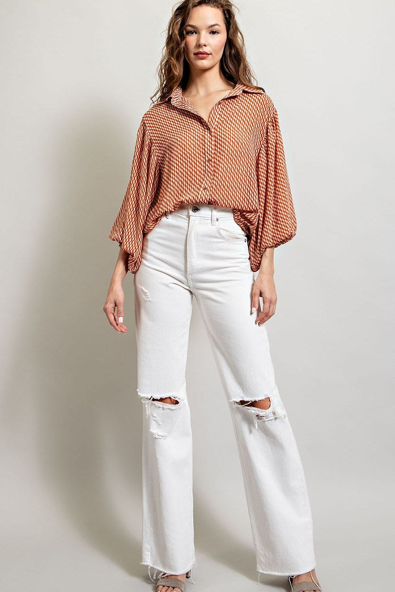 Printed blouse top with collared neckline, button down front, and smocked cuffs Blouse EE:Some