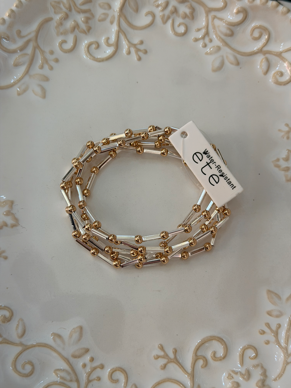 Water resistant rods and beads stacked bracelet