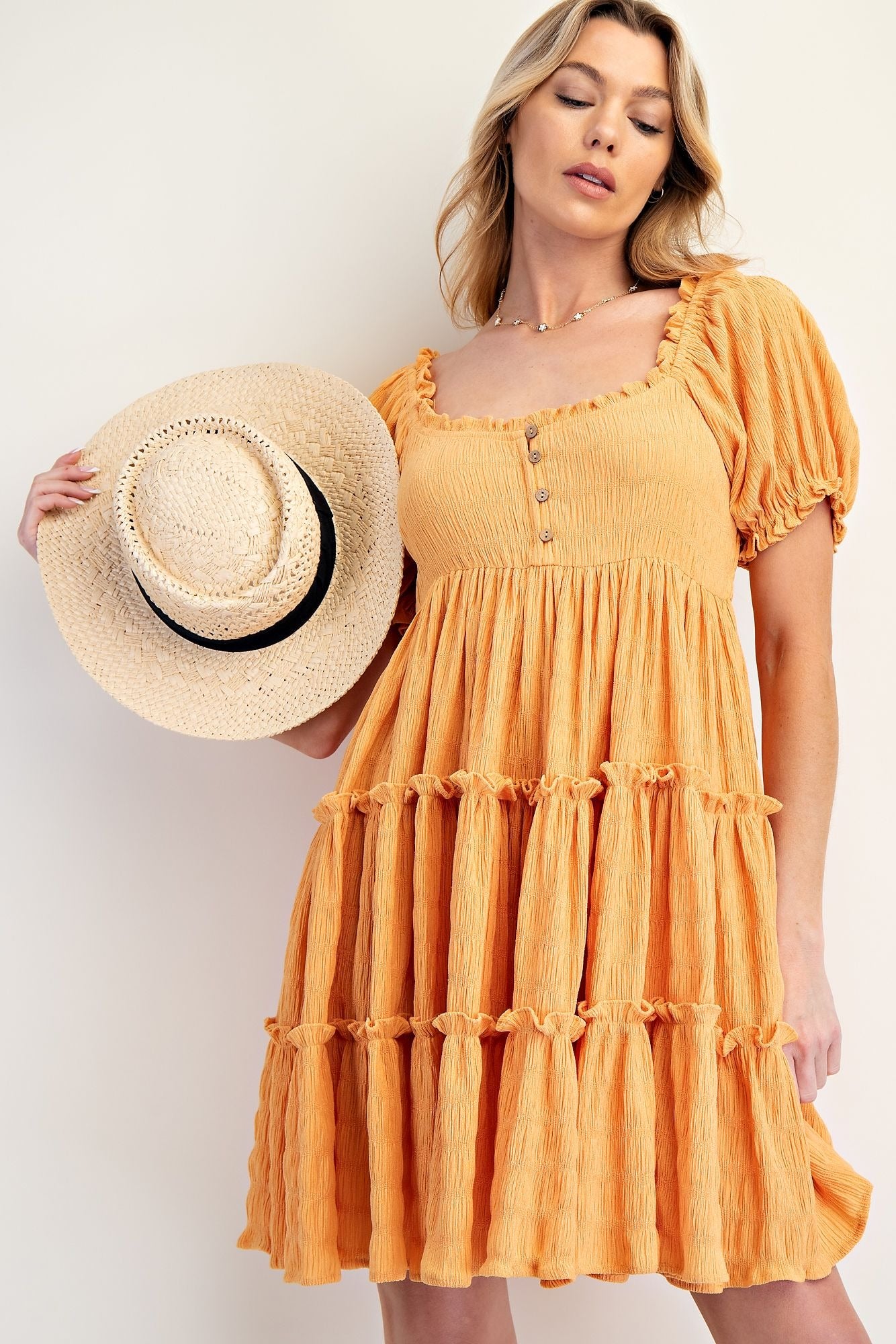 Nylon knit tiered dress with puffed sleeves and square neckline