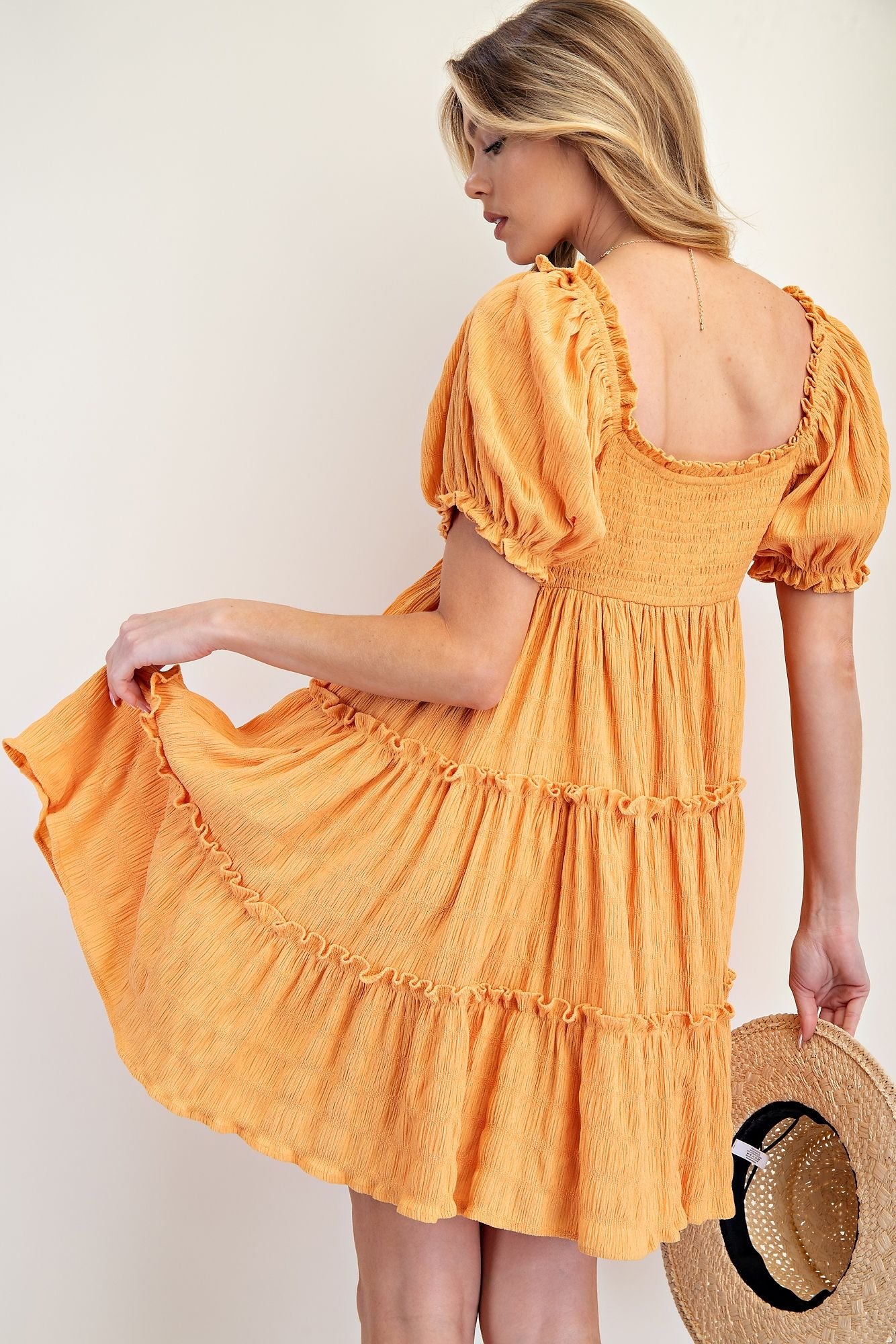Nylon knit tiered dress with puffed sleeves and square neckline