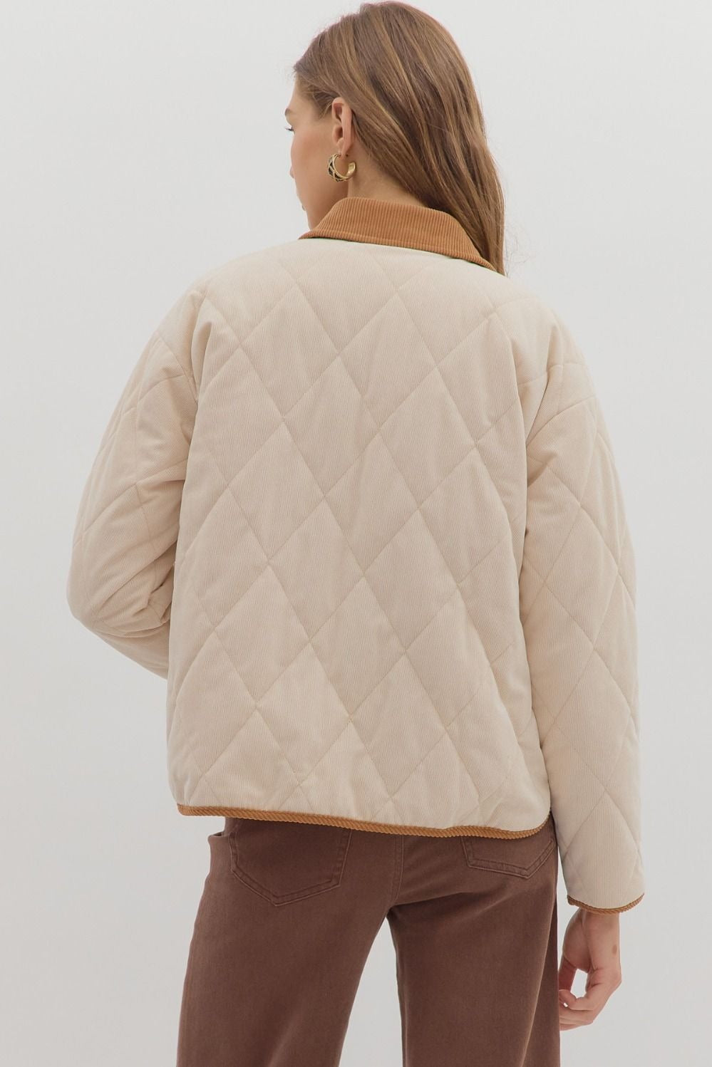 Diamond pattern quilted jacket with contrast collar adn binding detail