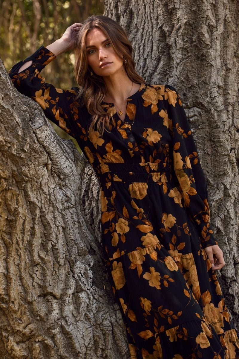 Floral printed tiered maxi dress with elastic waist and buttoned neckline
