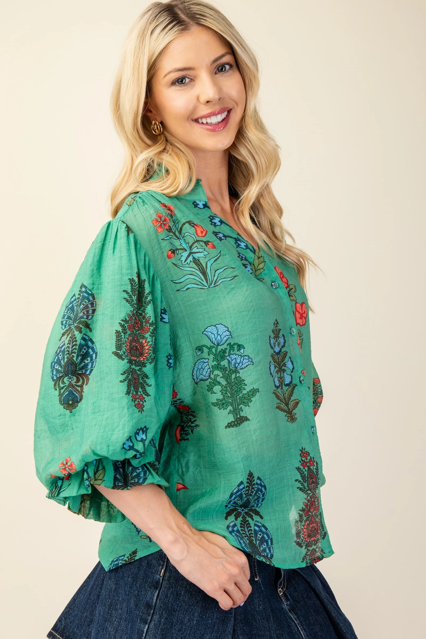 Printed button down top with 3/4 length gathered balloon sleeves