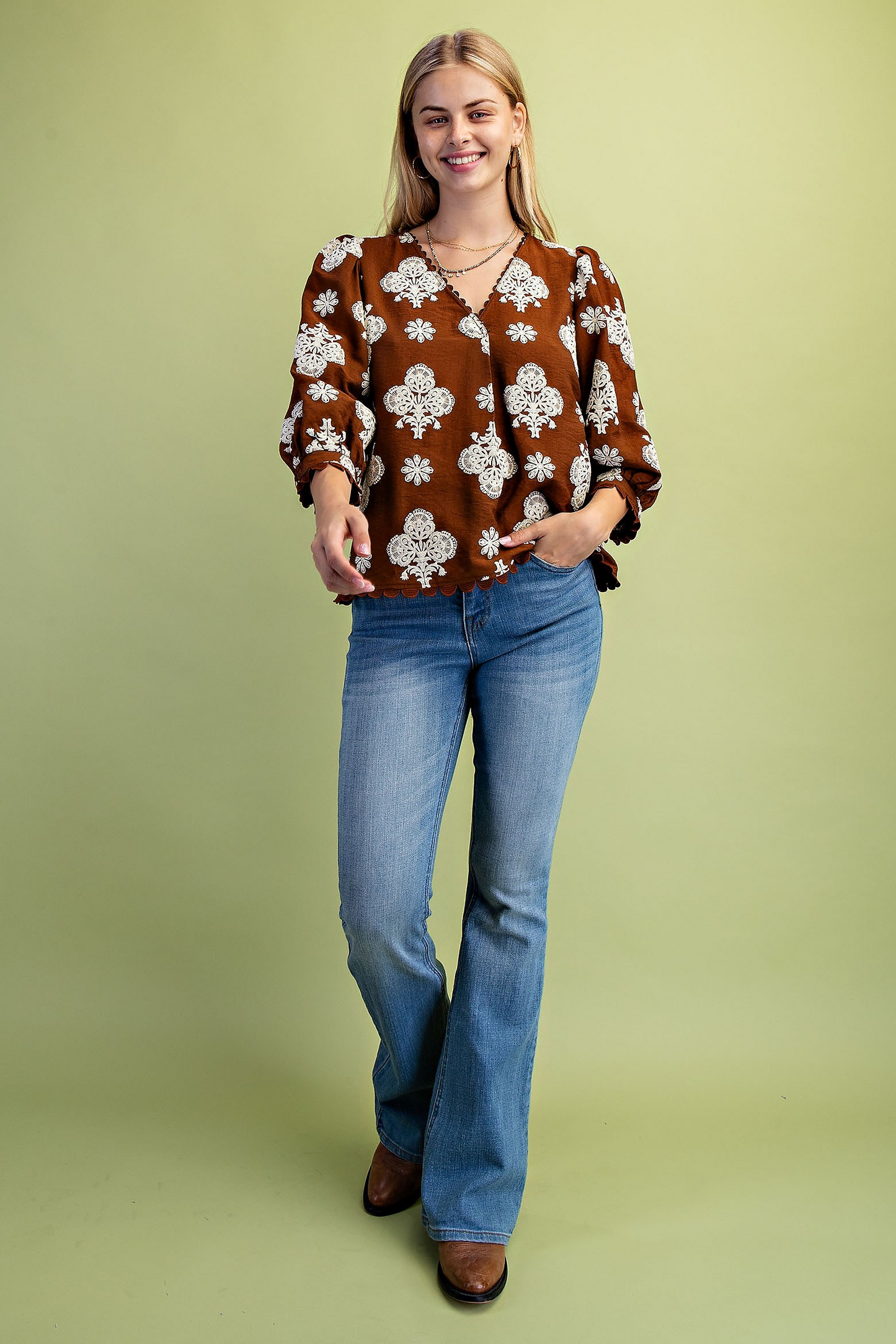 Puff printed v-neck blouse with 3/4 length sleeves and ric-rac trim