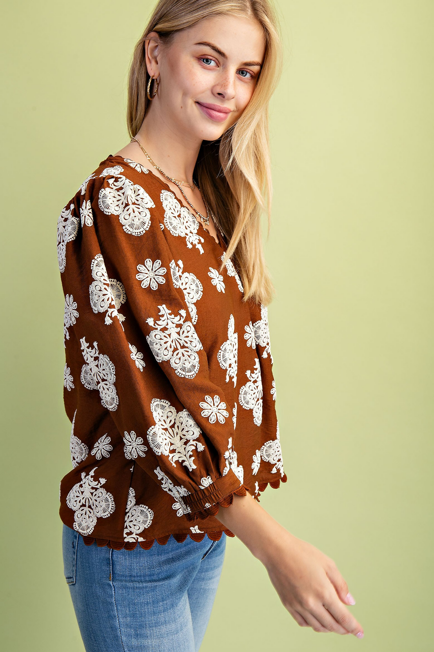 Puff printed v-neck blouse with 3/4 length sleeves and ric-rac trim