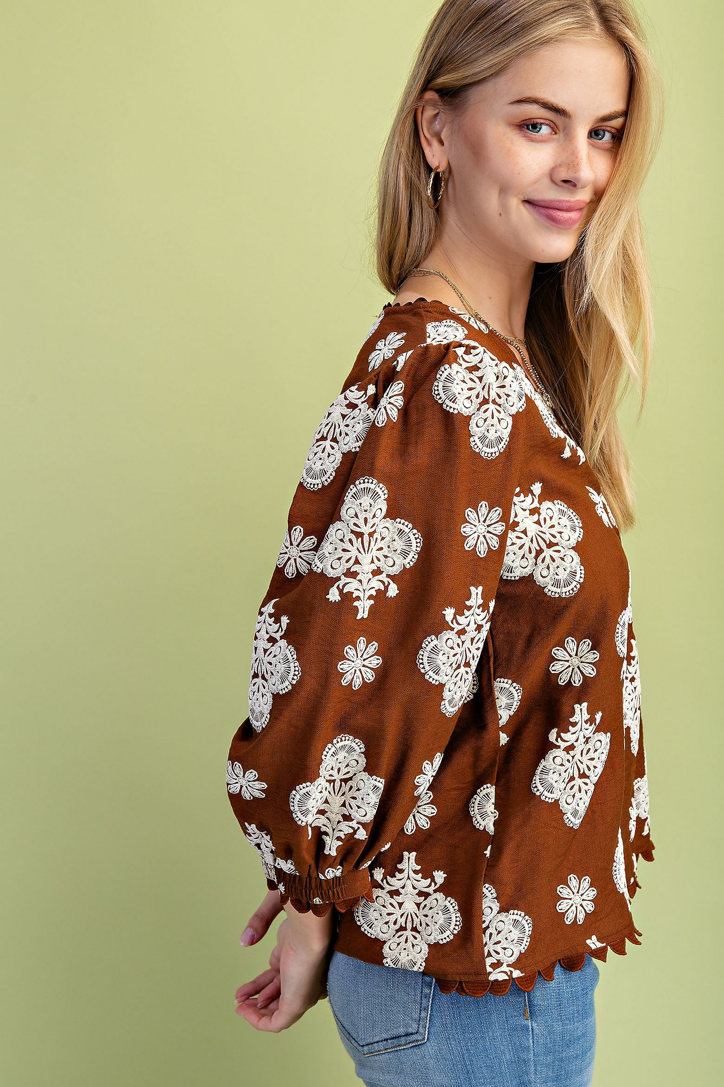 Puff printed v-neck blouse with 3/4 length sleeves and ric-rac trim