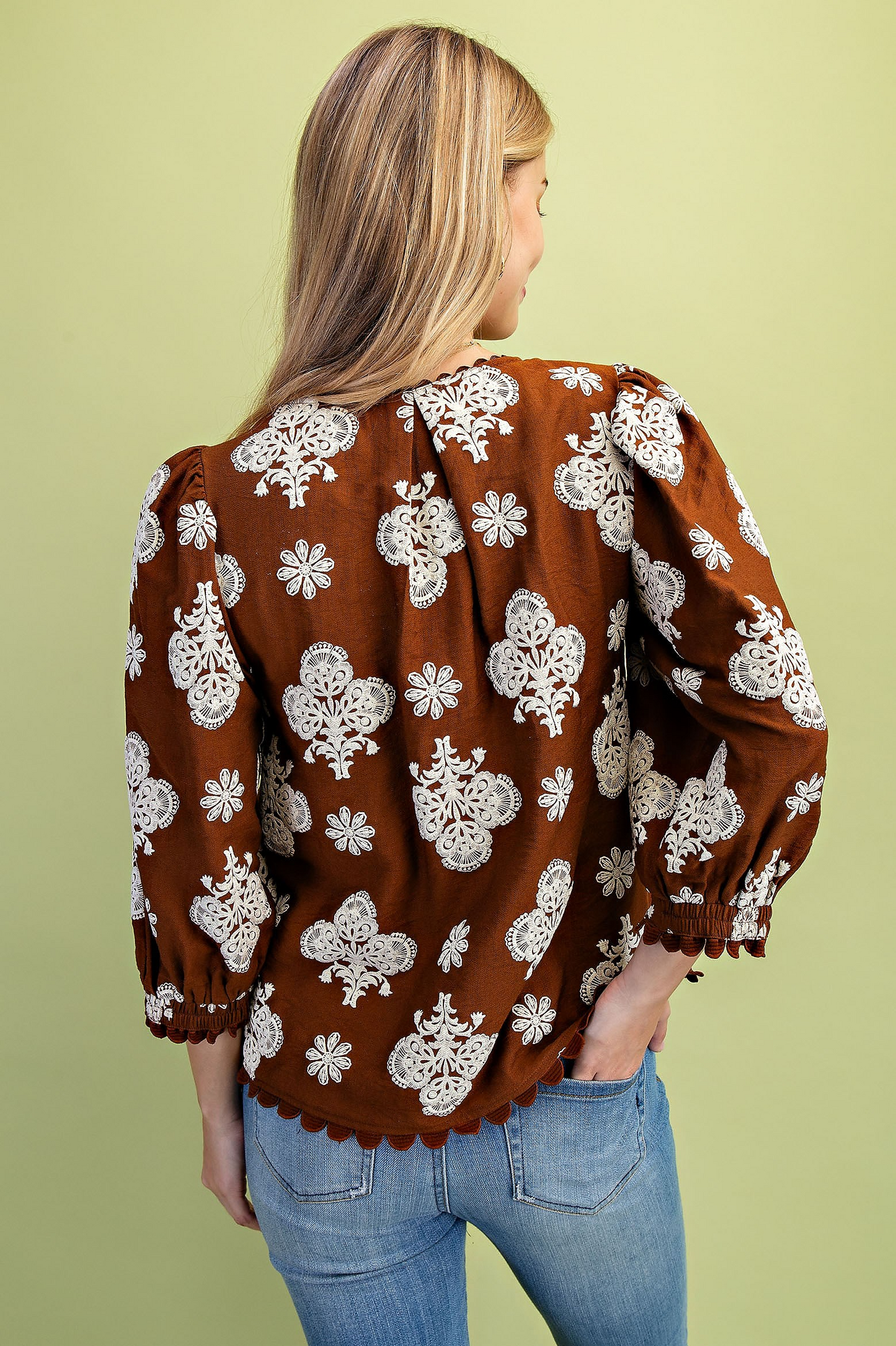 Puff printed v-neck blouse with 3/4 length sleeves and ric-rac trim