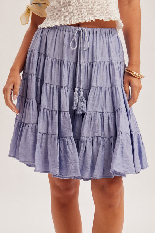 Tiered midi skirt with tassel