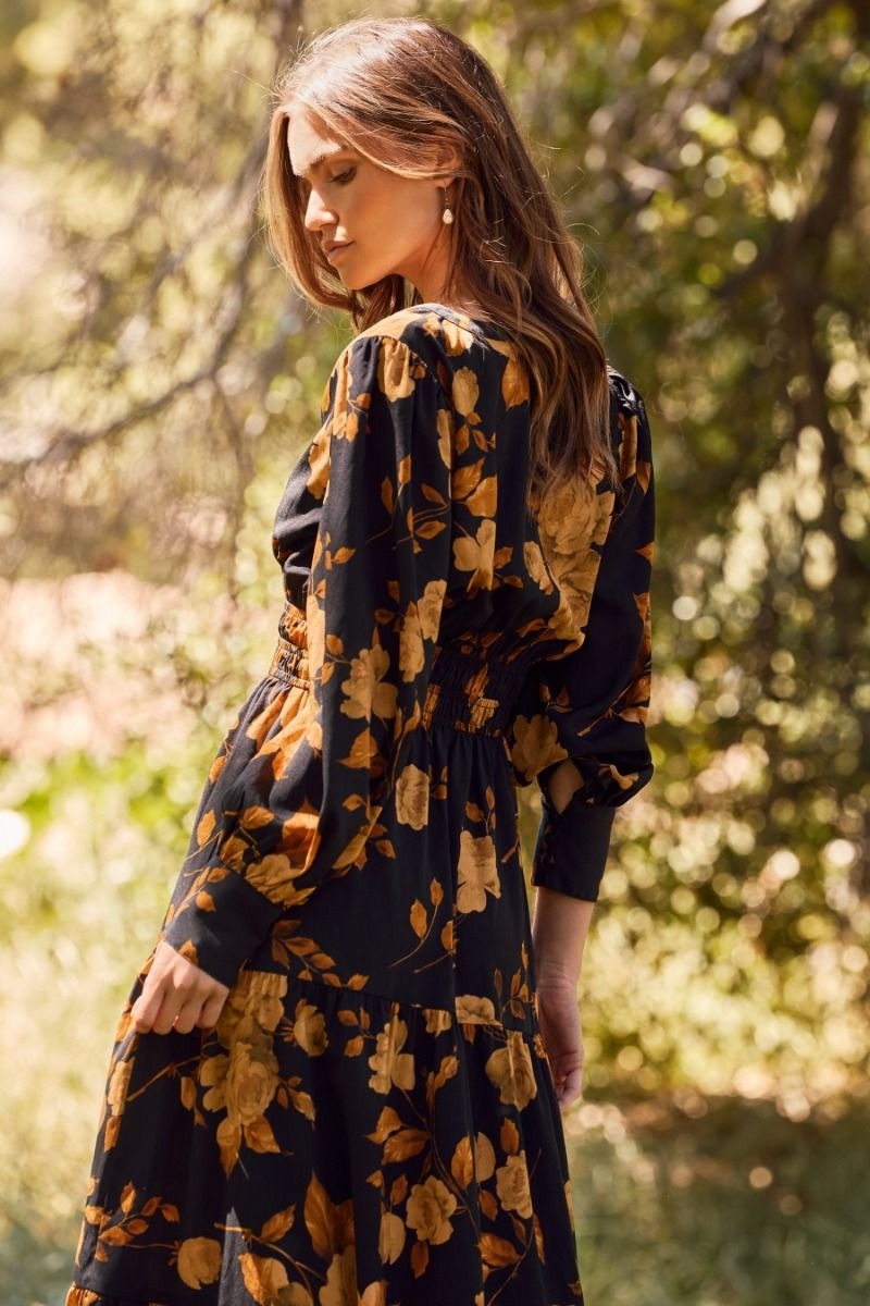 Floral printed tiered maxi dress with elastic waist and buttoned neckline