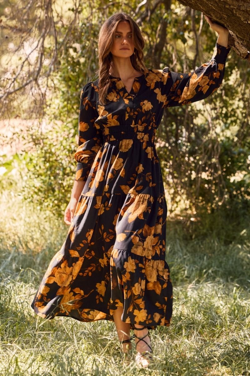 Floral printed tiered maxi dress with elastic waist and buttoned neckline