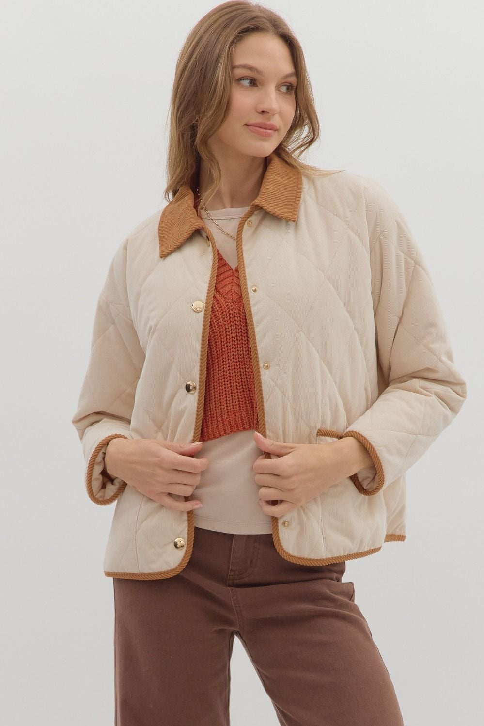 Diamond pattern quilted jacket with contrast collar adn binding detail