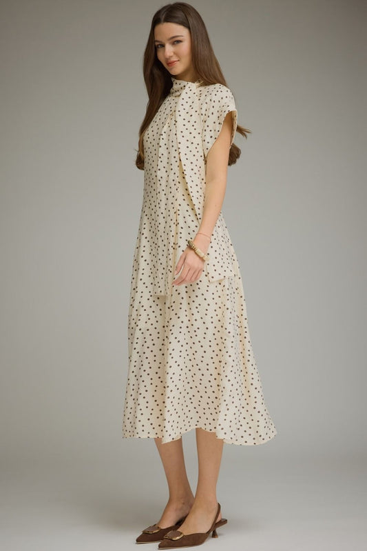 Polka dot short sleeve midi dress featuring a self-tie neck