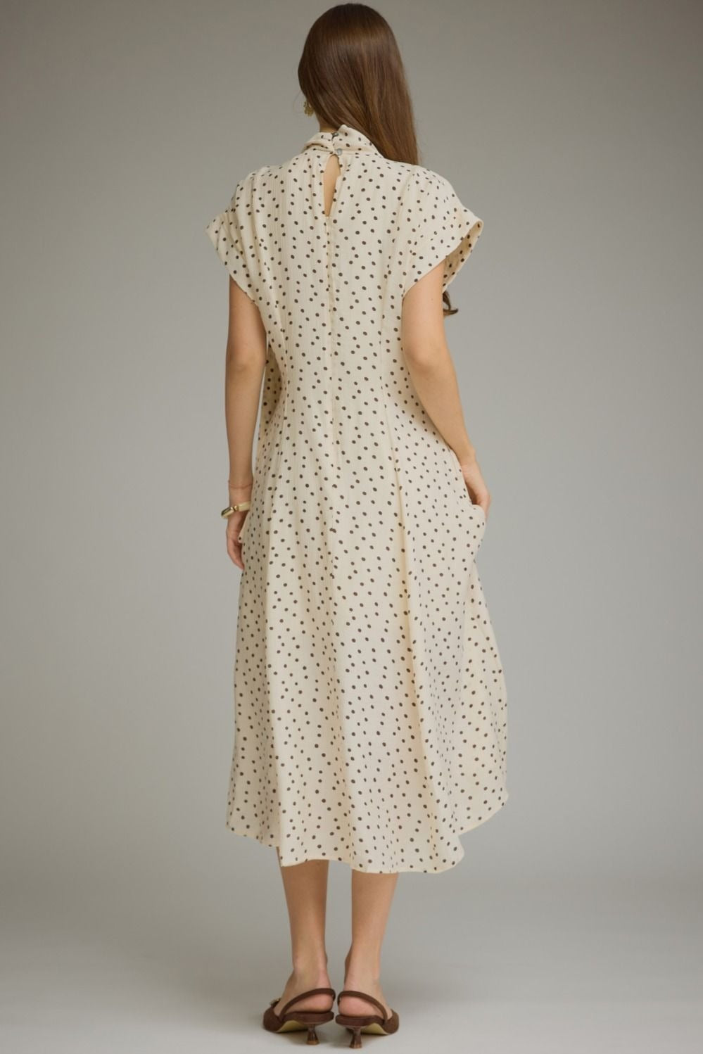 Polka dot short sleeve midi dress featuring a self-tie neck