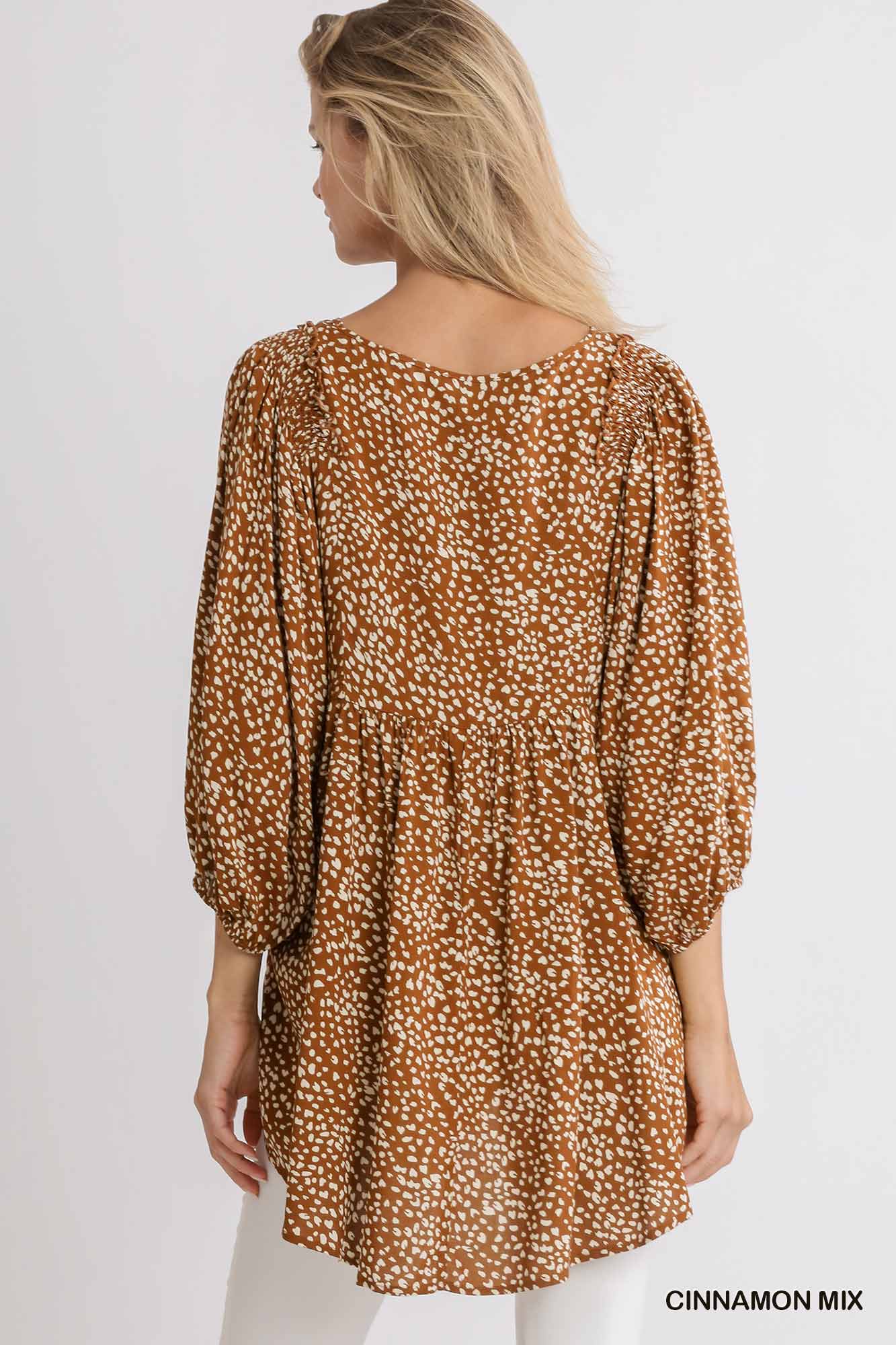 Animal Print 3/4 Sleeve Babydoll Top with Keyhole Front and Smocked Shoulder Detail Ivy and Pearl Boutique