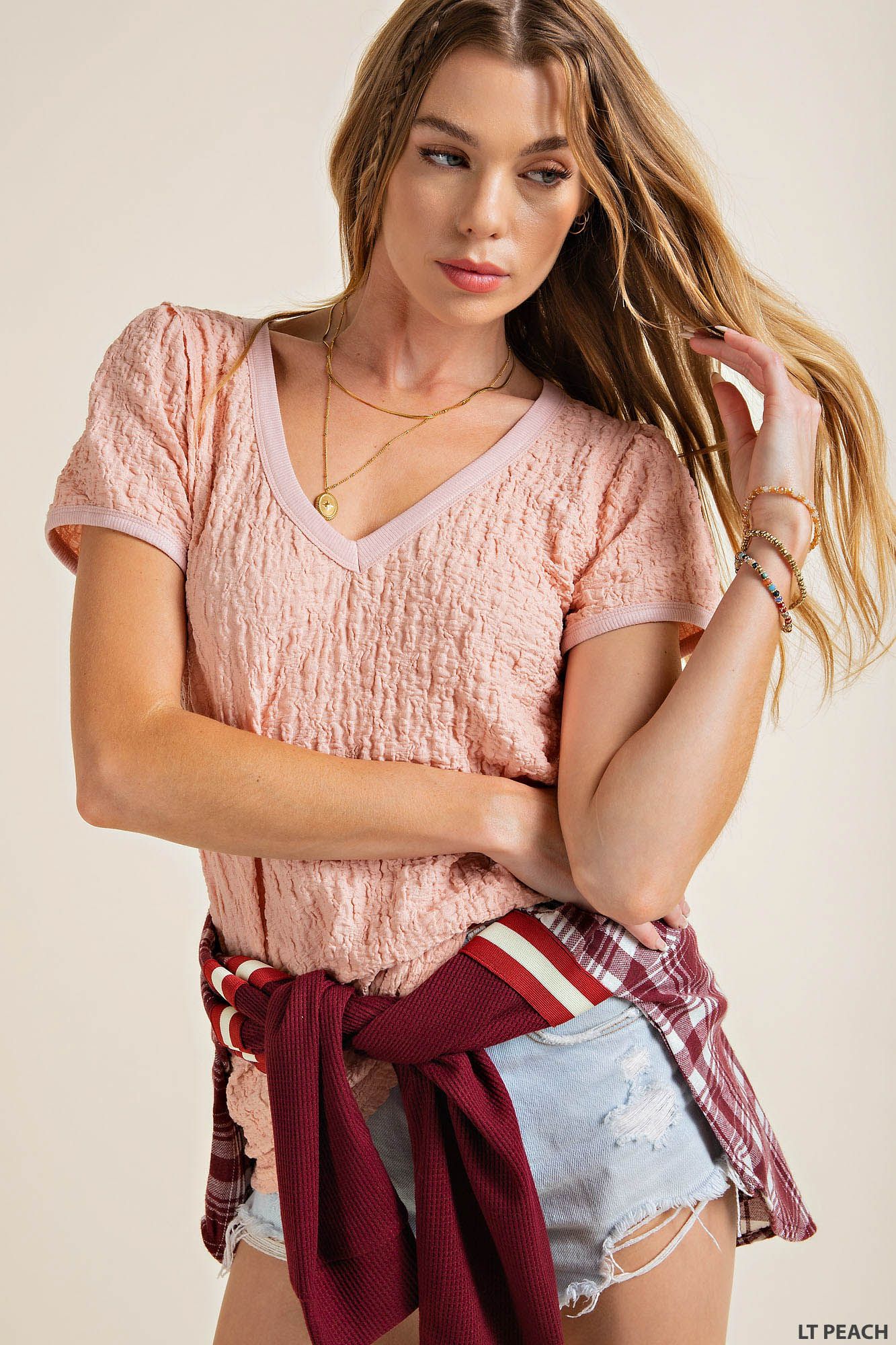 Soft knit bubble texture fabric ribbed V-Neck and sleeve edge top Blouse Kori