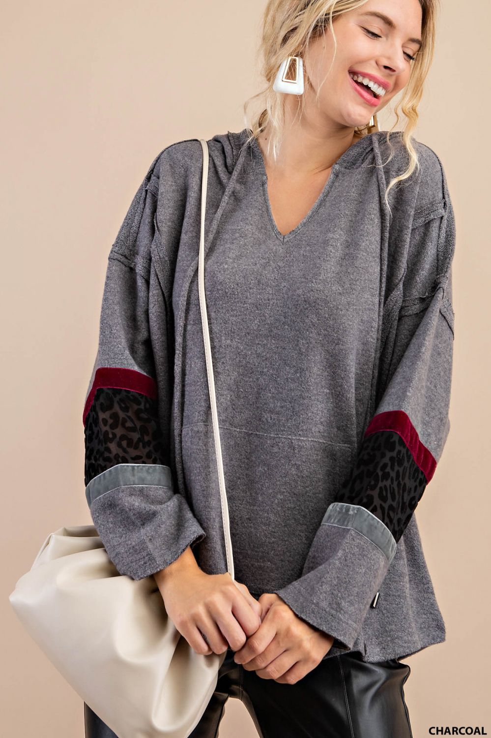 Distressed raw hem hoodie with animal print patch and front pockets Ivy and Pearl Boutique Charcoal S