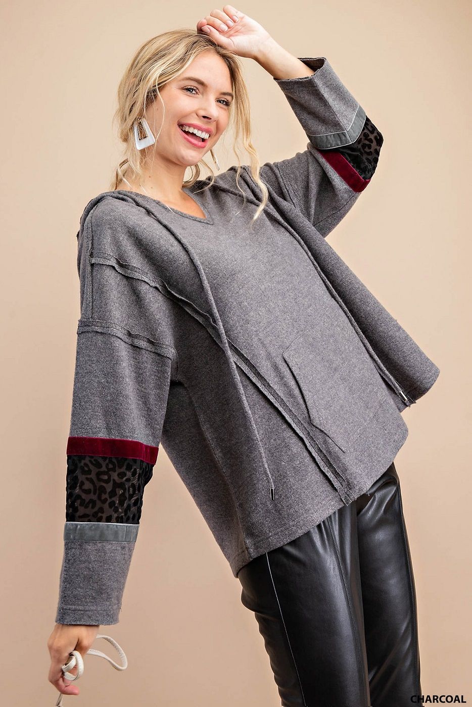 Distressed raw hem hoodie with animal print patch and front pockets Ivy and Pearl Boutique