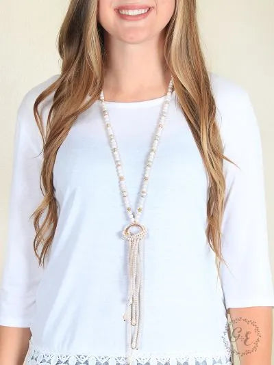 Elegant Ivory Beaded Tassel Necklace with Gold Ring Accent Ivy and Pearl Boutique