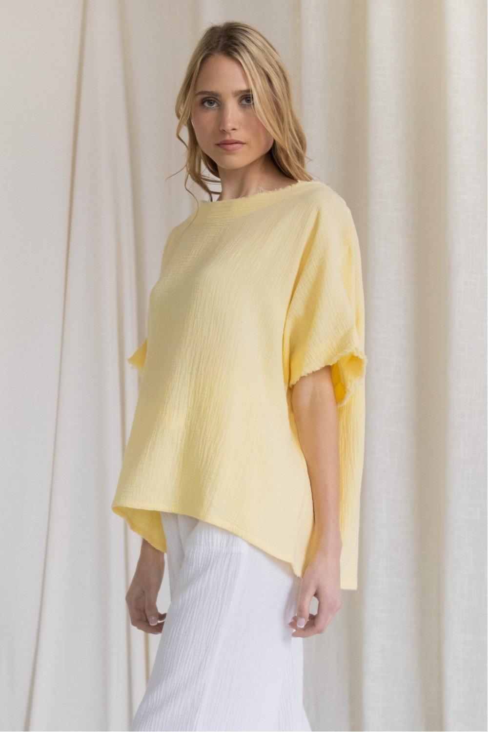 Gauze raw edge poncho top  Ivy and Pearl Boutique