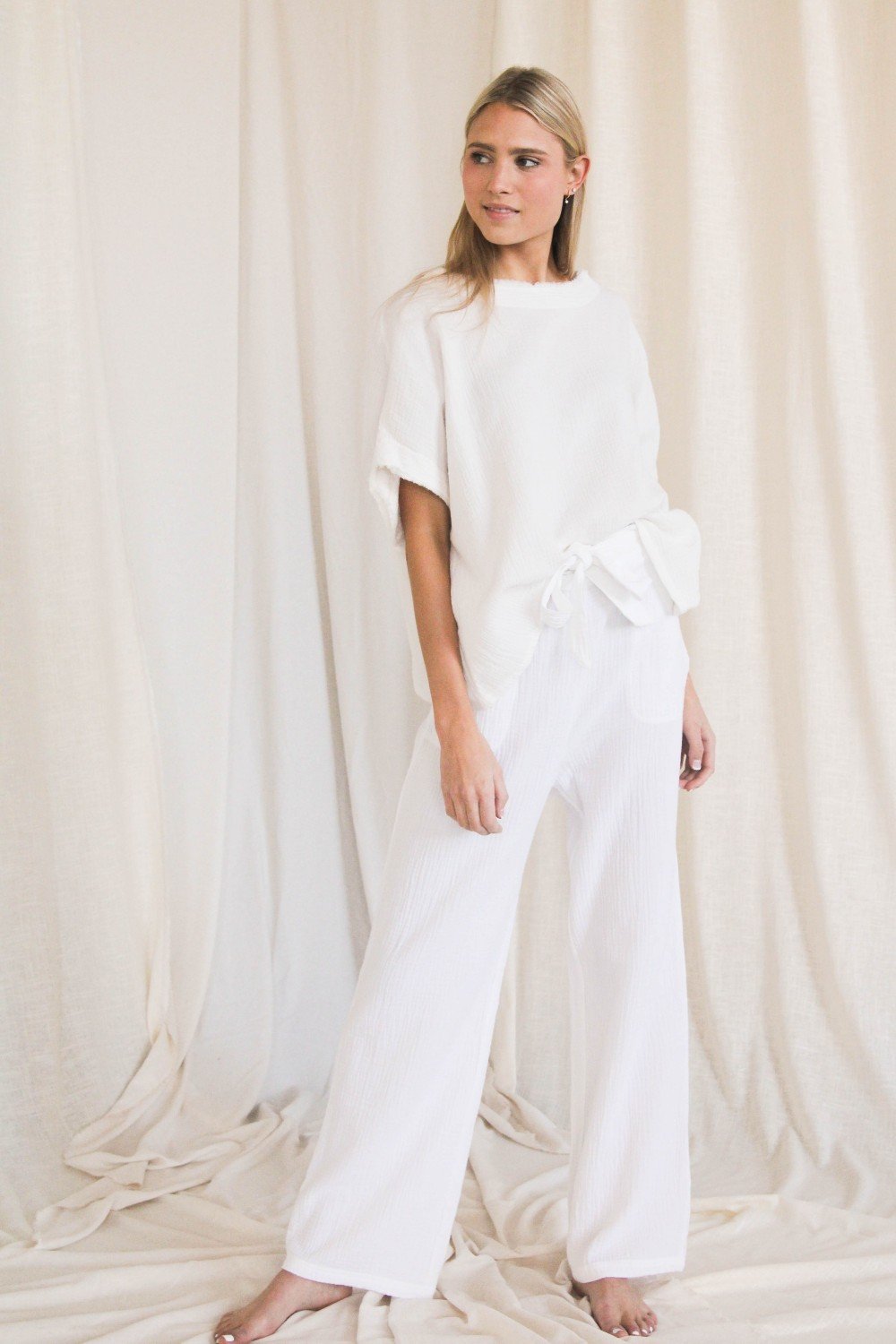 Gauze raw edge poncho top  Ivy and Pearl Boutique