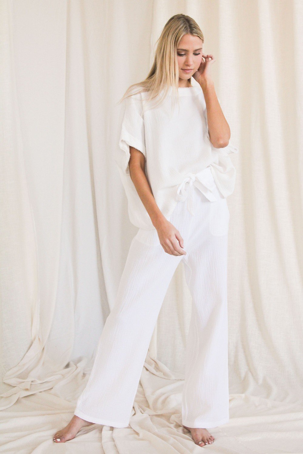 Gauze raw edge poncho top  Ivy and Pearl Boutique
