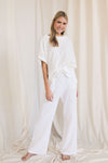 Gauze raw edge poncho top  Ivy and Pearl Boutique
