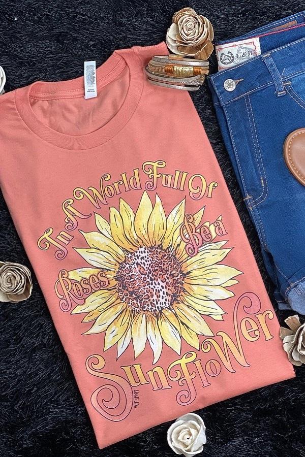 In a World Full of Roses, Be a Sunflower T-Shirt Ivy and Pearl Boutique S Coral