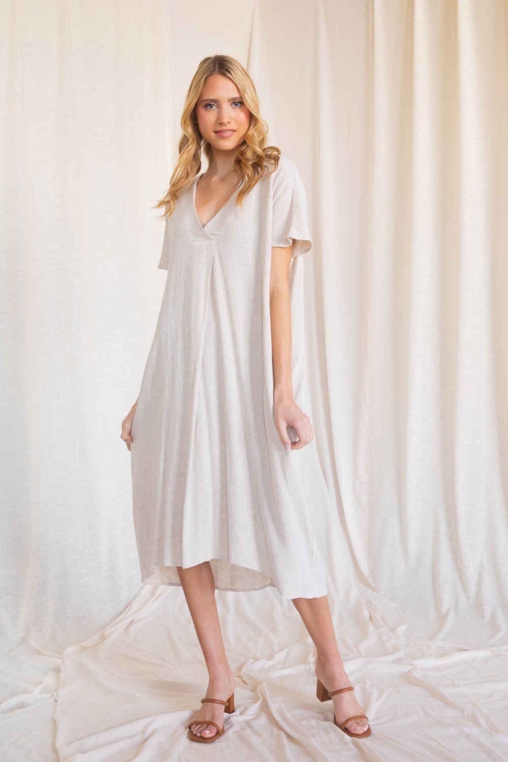 Linen maxi dress with a v neckline and side pockets (multiple colors available)  Ivy and Pearl Boutique   
