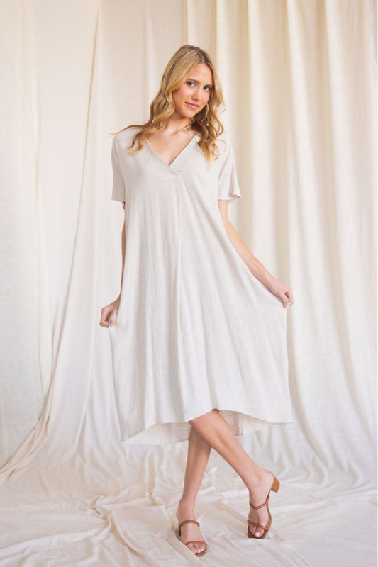 Linen maxi dress with a v neckline and side pockets (multiple colors available)  Ivy and Pearl Boutique