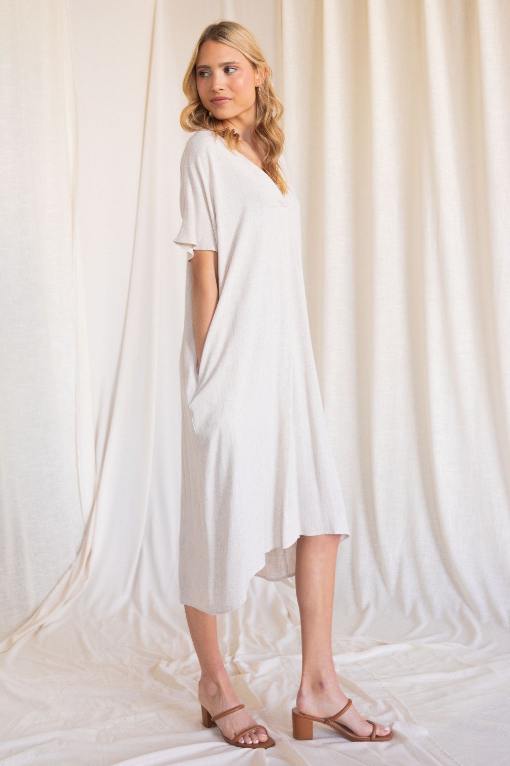 Linen maxi dress with a v neckline and side pockets (multiple colors available)  Ivy and Pearl Boutique