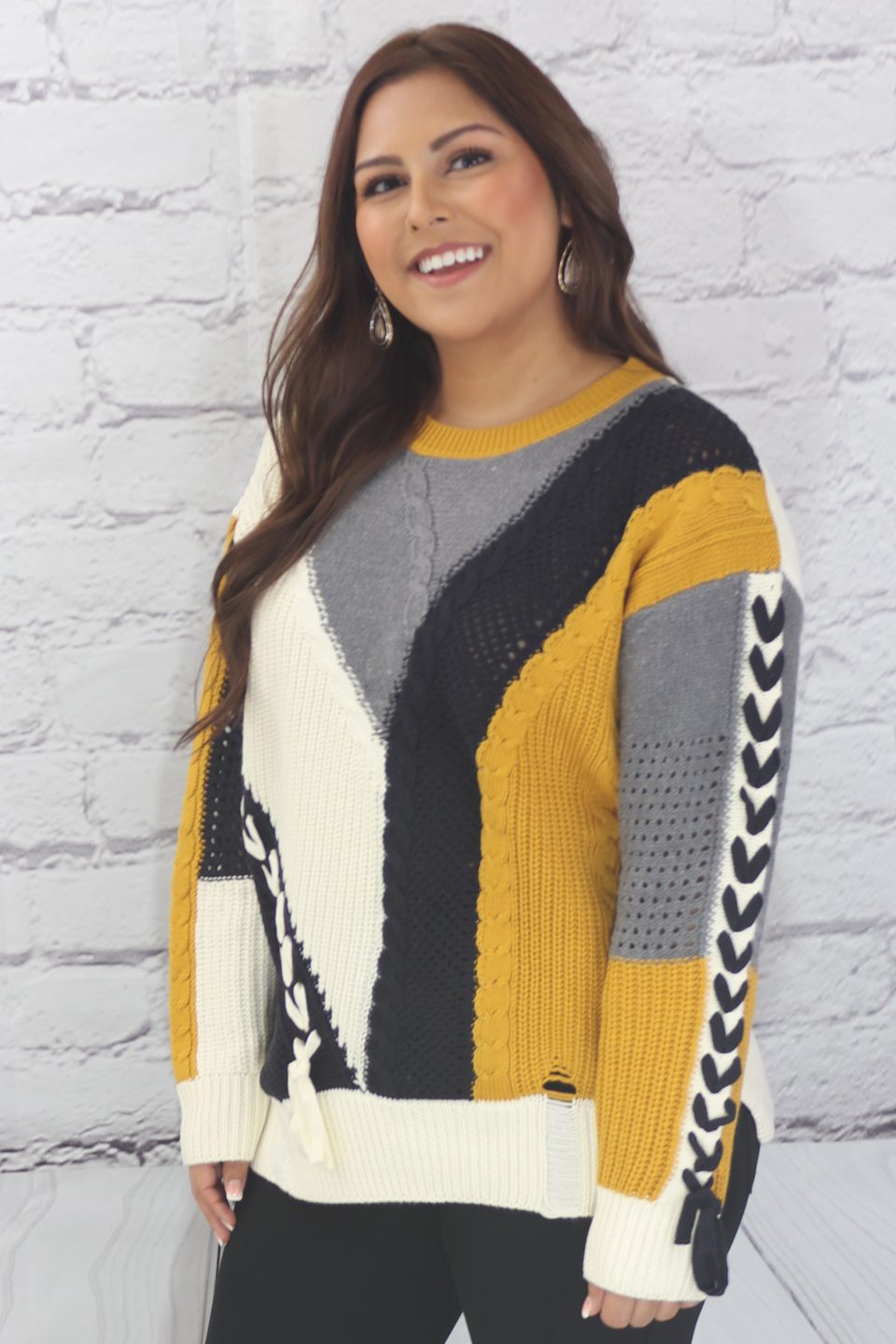 Long sleeve color block cable knit sweater with lace-up trim Ivy and Pearl Boutique