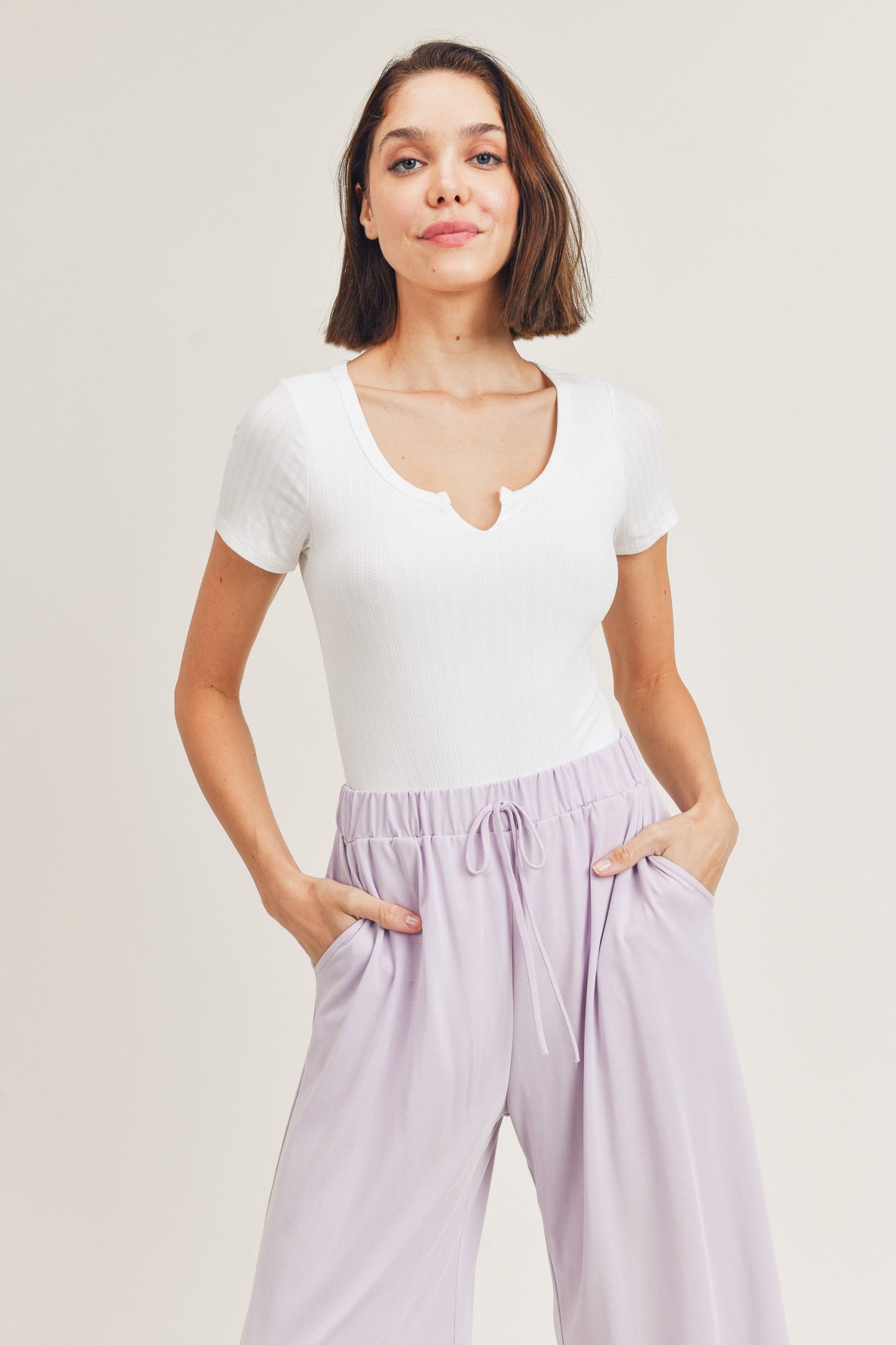 Pointelle double layered notch neck short sleeve bodysuit  Ivy and Pearl Boutique