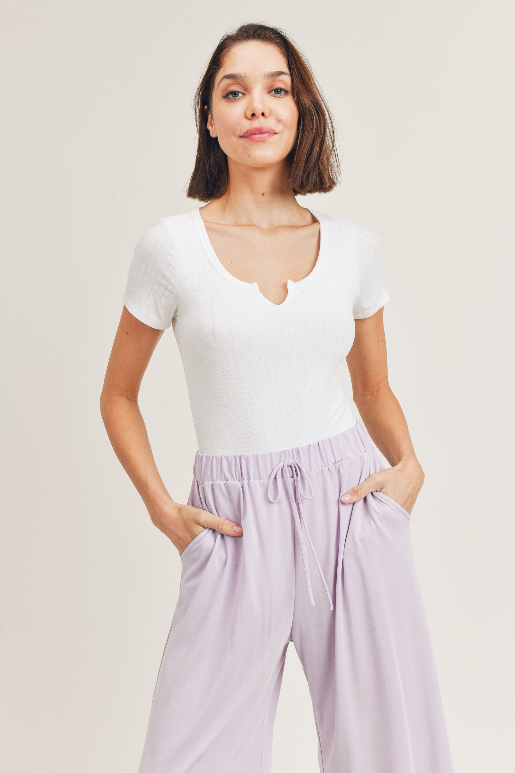 Pointelle double layered notch neck short sleeve bodysuit  Ivy and Pearl Boutique