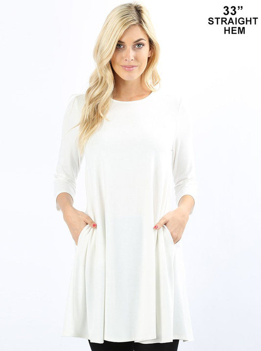Three quarter sleeve swing tunic with side pockets  Ivy and Pearl Boutique Ivory S