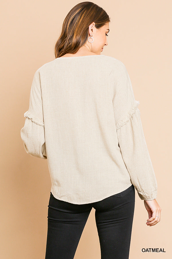 Linen blend long puff sleeve button front V-neck top with center knot and ruffle details Ivy and Pearl Boutique