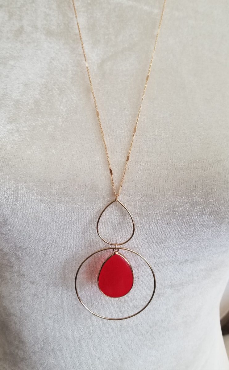Red teardrop dangle earrings with golden trim Ivy and Pearl Boutique