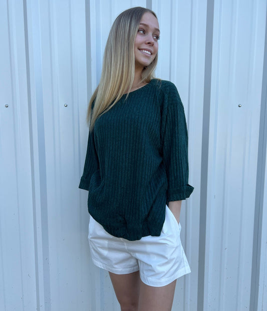 Ribbed knit 3/4 folded sleeve round neck top with side slits and high-low hem  Ivy and Pearl Boutique Green S