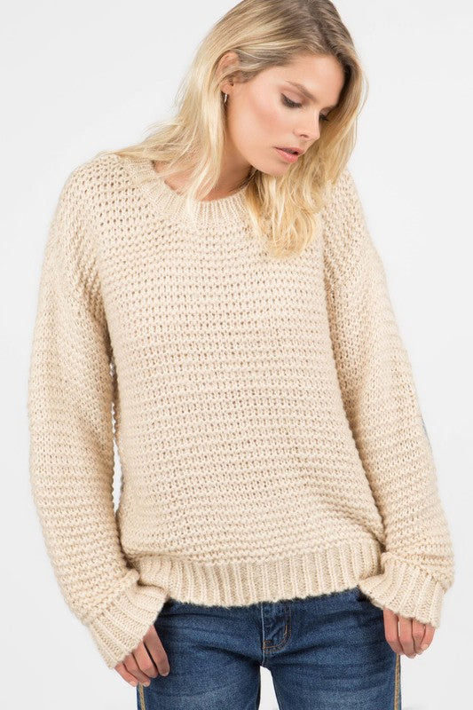 Basic ribbed pullover sweater with multi-colored floral elbow patch Ivy and Pearl Boutique