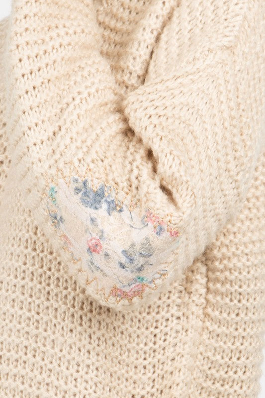 Basic ribbed pullover sweater with multi-colored floral elbow patch Ivy and Pearl Boutique