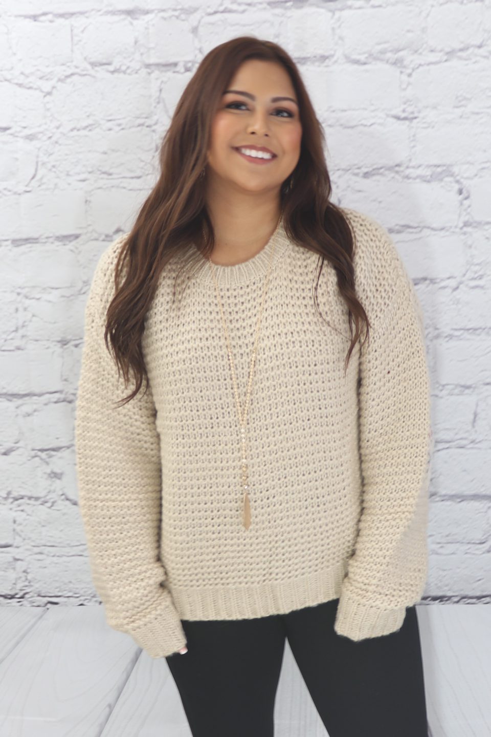 Basic ribbed pullover sweater with multi-colored floral elbow patch Ivy and Pearl Boutique