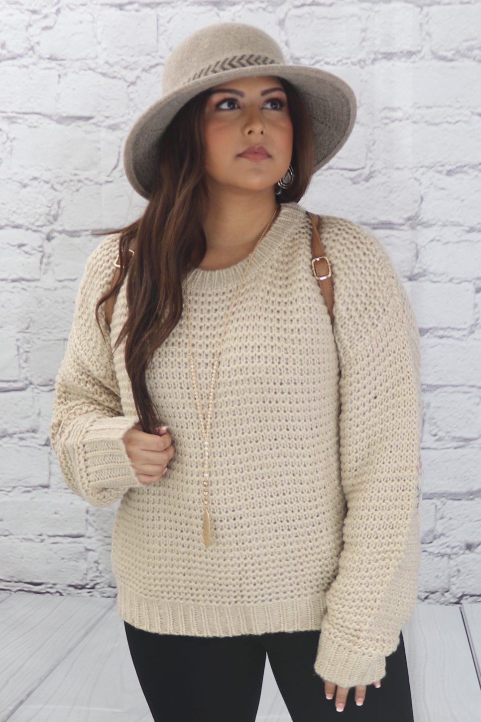 Basic ribbed pullover sweater with multi-colored floral elbow patch Ivy and Pearl Boutique