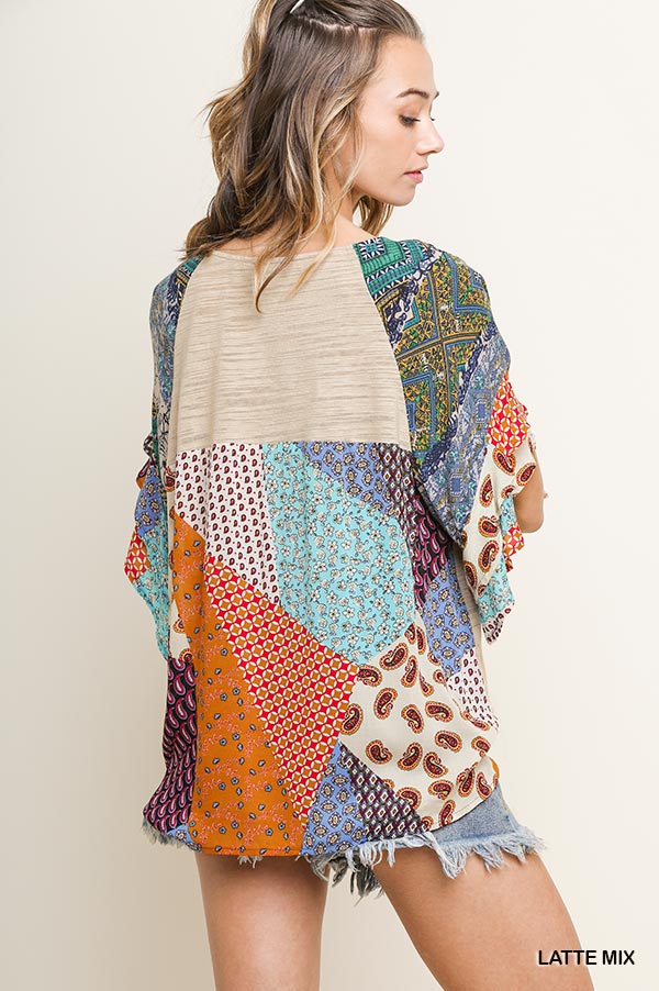 Mixed print round neck heathered knit top with layered ruffle sleeves and waist tie Ivy and Pearl Boutique