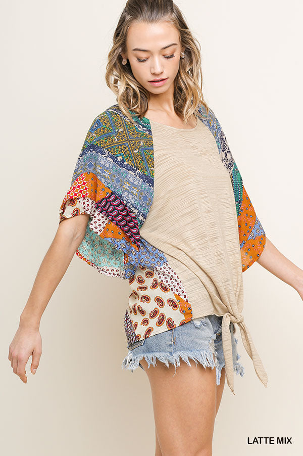 Mixed print round neck heathered knit top with layered ruffle sleeves and waist tie Ivy and Pearl Boutique