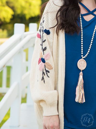 Thick knit cardigan with embroidered flower sleeves Ivy and Pearl Boutique